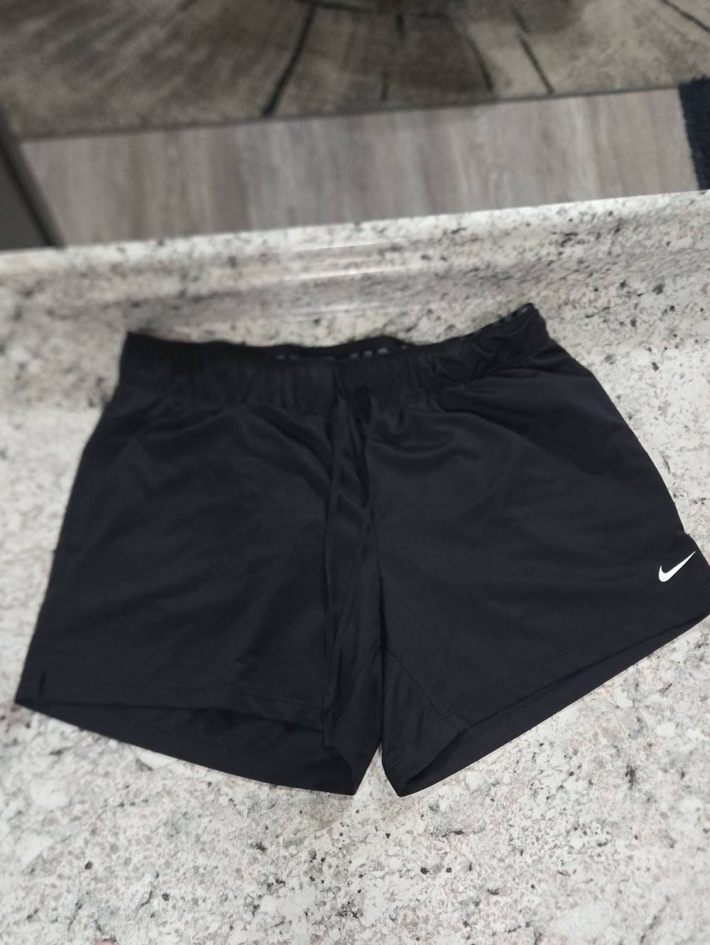 Nike Black Women’s Athletic Shorts with White Swoosh